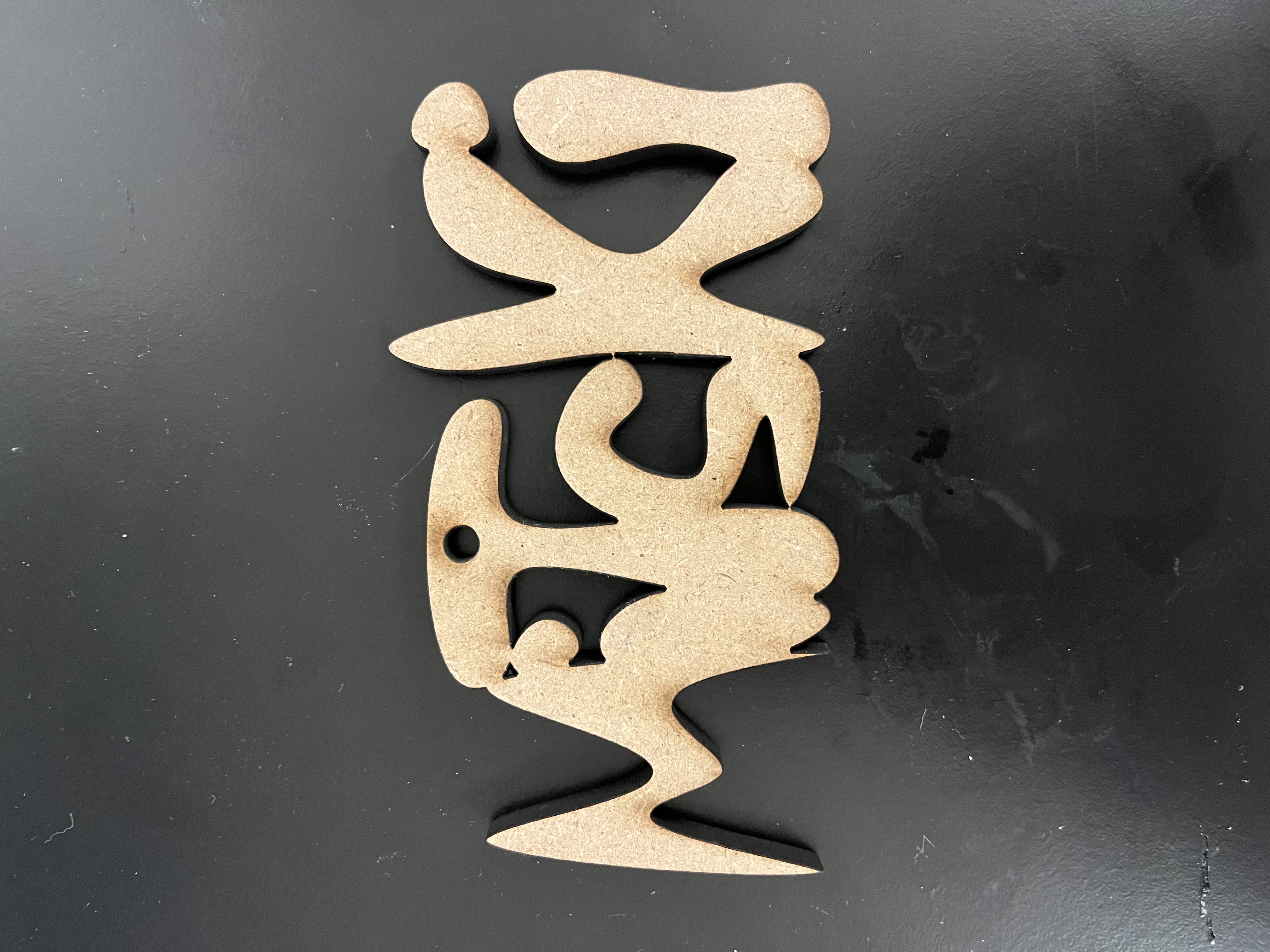 A second laser-cut keychain design from the workshop